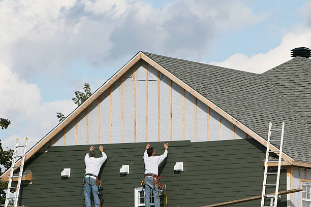 Professional Storm Damage Siding Repair technician working in Atlantic, VA